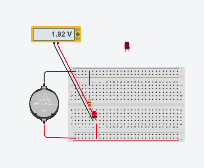 The same circuit with the multimeter probes across the LED reading 1.92 V